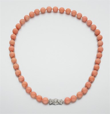 Lot 3041 - Coral Bead Necklace with Diamond Clasp