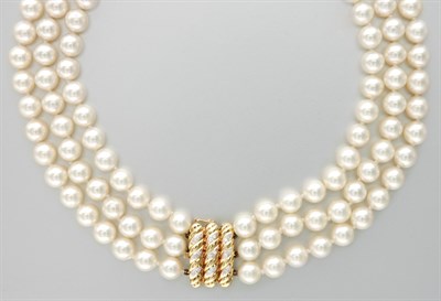 Lot 3098 - Triple Strand Cultured Pearl Necklace with Gold and Diamond Clasp