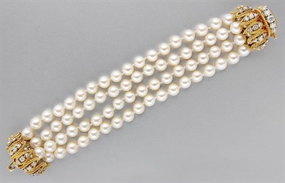 Lot 3229 - Four Strand Cultured Pearl Bracelet with Gold and Diamond Clasp