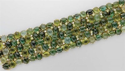Lot 3112 - Cabochon Tourmaline and Peridot and Diamond Cuff Bracelet