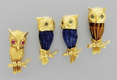 Lot 3073 - Gold, Fluted Lapis, Tiger's Eye and Gem-Set Owl Brooches