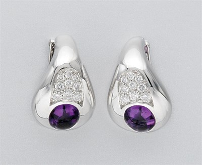 Lot 3253 - Pair of White Gold, Cabochon Amethyst and Diamond Earclips