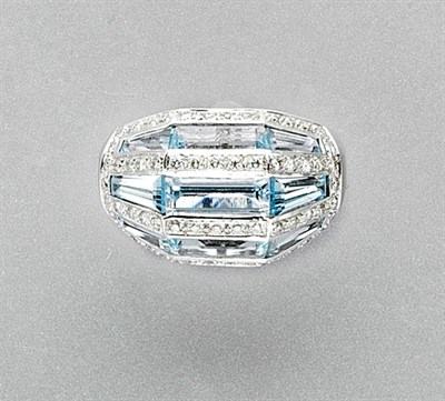 Lot 3369 - Blue Topaz and Diamond Ring