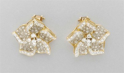 Lot 3114 - Pair of Two-Color Gold and Diamond Flower Earclips