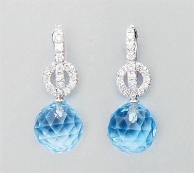 Lot 3099 - Pair of Blue Topaz and Diamond Pendant Earrings