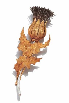 Lot 3594 - Two-Color Gold and Silver Thistle Clip-Brooch