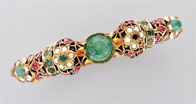 Lot 3196 - Indian Gold, Emerald, Ruby and Split Pearl Bangle