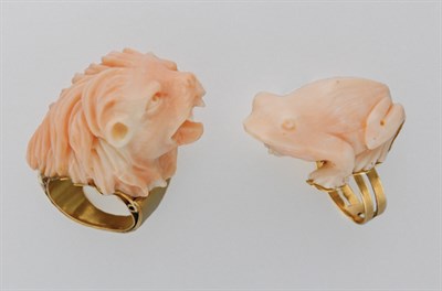 Lot 3211 - Two Carved Angel Skin Coral Rings