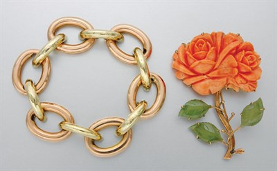 Lot 3264 - Carved Coral and Nephrite Flower Brooch and Two-Color Gold Bracelet