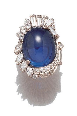 Lot 3578 - Cabochon Sapphire and Diamond Ring