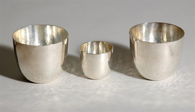 Lot 4709 - Three Cartier Sterling Silver Hammered Finish...