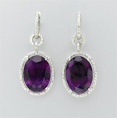 Lot 3346 - Pair of Amethyst and Diamond Pendant Earrings