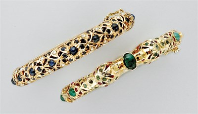 Lot 3395 - Two Gold, Gem-Set and Split Pearl Bangles