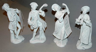 Lot 311 - Four Bisque Porcelain Figures of Musicians...