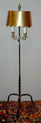 Lot 439 - Iron Two-Light Floor Lamp Brass shade. Height...
