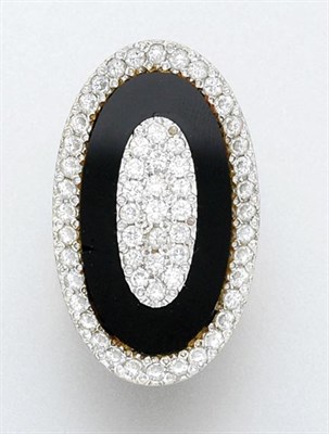 Lot 747 - Two-Color Gold, Diamond and Black Onyx Ring