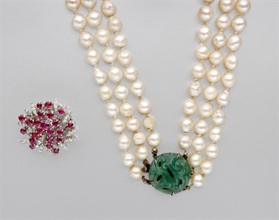 Lot 578 - Triple Strand Semi-Baroque Cultured Pearl Necklace and Ruby and Diamond Brooch