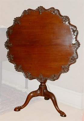 Lot 398 - George III Mahogany Tilt-Top Table The shaped...