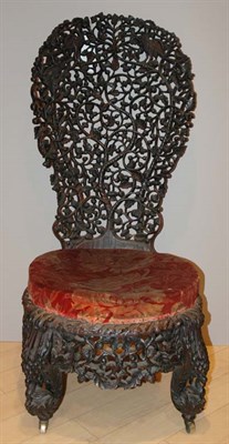Lot 146 - Anglo-Indian Fruit and Vine Carved Parlor Chair