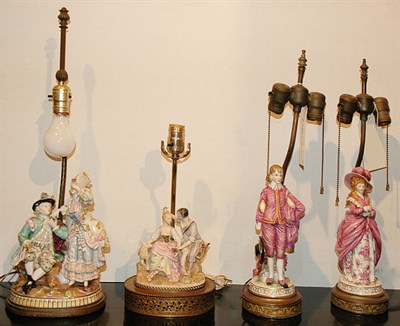 Lot 1225 - Group of Four Porcelain Figural Lamps...