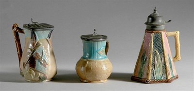 Lot 3454 - Three English Pewter Mounted Majolica Syrup...