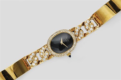 Lot 229 - Gold and Diamond Wristwatch