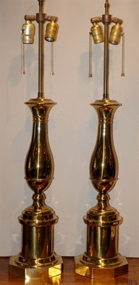 Lot 535 - Pair of Brass Baluster-Form Two-Light Lamps...