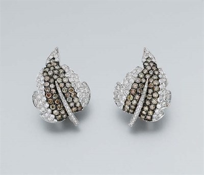 Lot 812 - Pair of Diamond and Brown Diamond Leaf Earclips