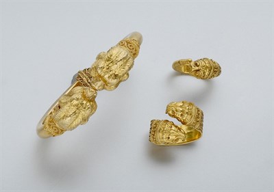 Lot 583 - Gold Gargoyle Head Bangle and Two Rings