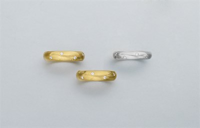 Lot 231 - Three Gold, Platinum and Diamond Band Rings