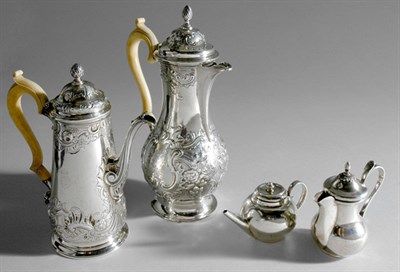 Lot 3356 - Two English Silver Coffee Pots; Together with...