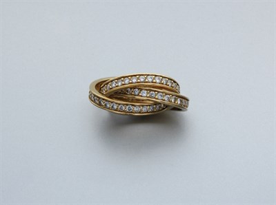 Lot 300A - Gold and Diamond Interlocking Band Ring