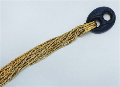 Lot 97 - Twelve Strand Two-Color Gold and Lapis Bracelet