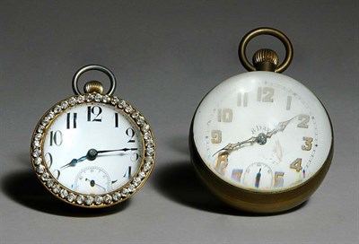 Lot 3260 - Swiss Glass Ball Eight-Day Clock; Together...
