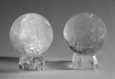 Lot 3303 - Pair of Rock Crystal Orbs on Rock Crystal...