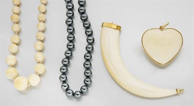 Lot 264 - Lot of Assorted Bone and Plastic Jewelry
