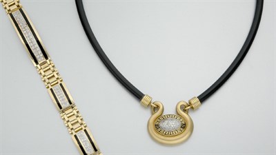 Lot 865 - Gold, Enamel and Diamond Pendant with Rubber Necklace and Bracelet