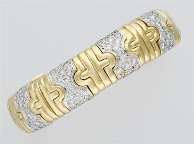 Lot 793 - Two-Color Gold and Diamond Bangle