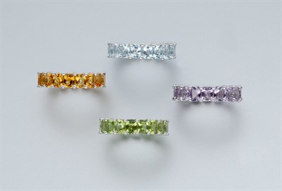 Lot 615 - Four Gem-Set Band Rings
