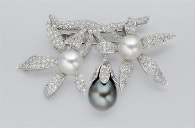 Lot 592 - Black and White Cultured Pearl and Diamond Flower Brooch