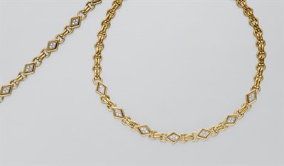 Lot 932 - Gold and Diamond Necklace and Bracelet
