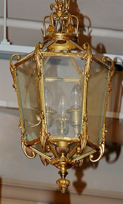 Lot 3406 - Rococo Style Gilt-Metal and Glass Three-Light...