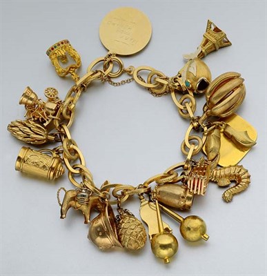 Lot 663 - Gold Charm Bracelet