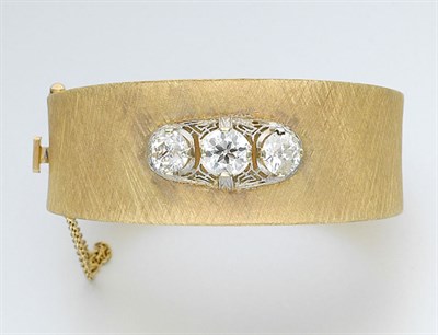 Lot 674 - Gold and Diamond Bangle