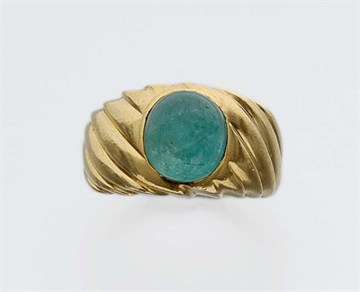 Lot 672 - Gold and Cabochon Emerald Ring