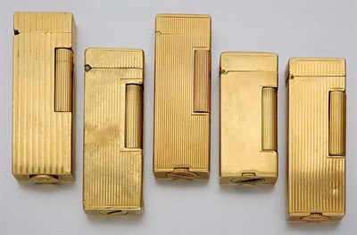 Lot 555 - Five Cigarette Lighters