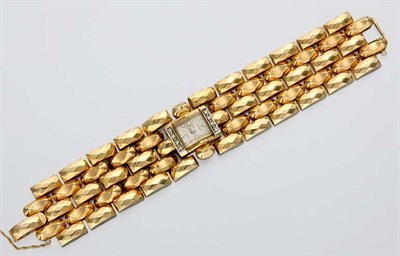 Lot 562 - Wide Gold and Diamond Wristwatch