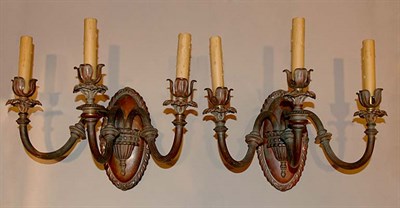 Lot 3340 - Pair of Gilt and Patinated-Metal Three-Light...