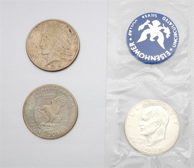 Lot 23 - One U.S. Silver Dollar and Three Clad Dollars