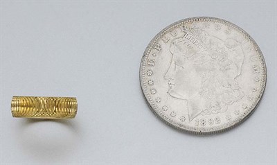 Lot 109 - Gold Band Ring and One U.S. Silver Dollar